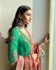 Alia Bhatt looks resplendent in the turquoise green outfit by Couturiers Rimple and Harpreet Narula